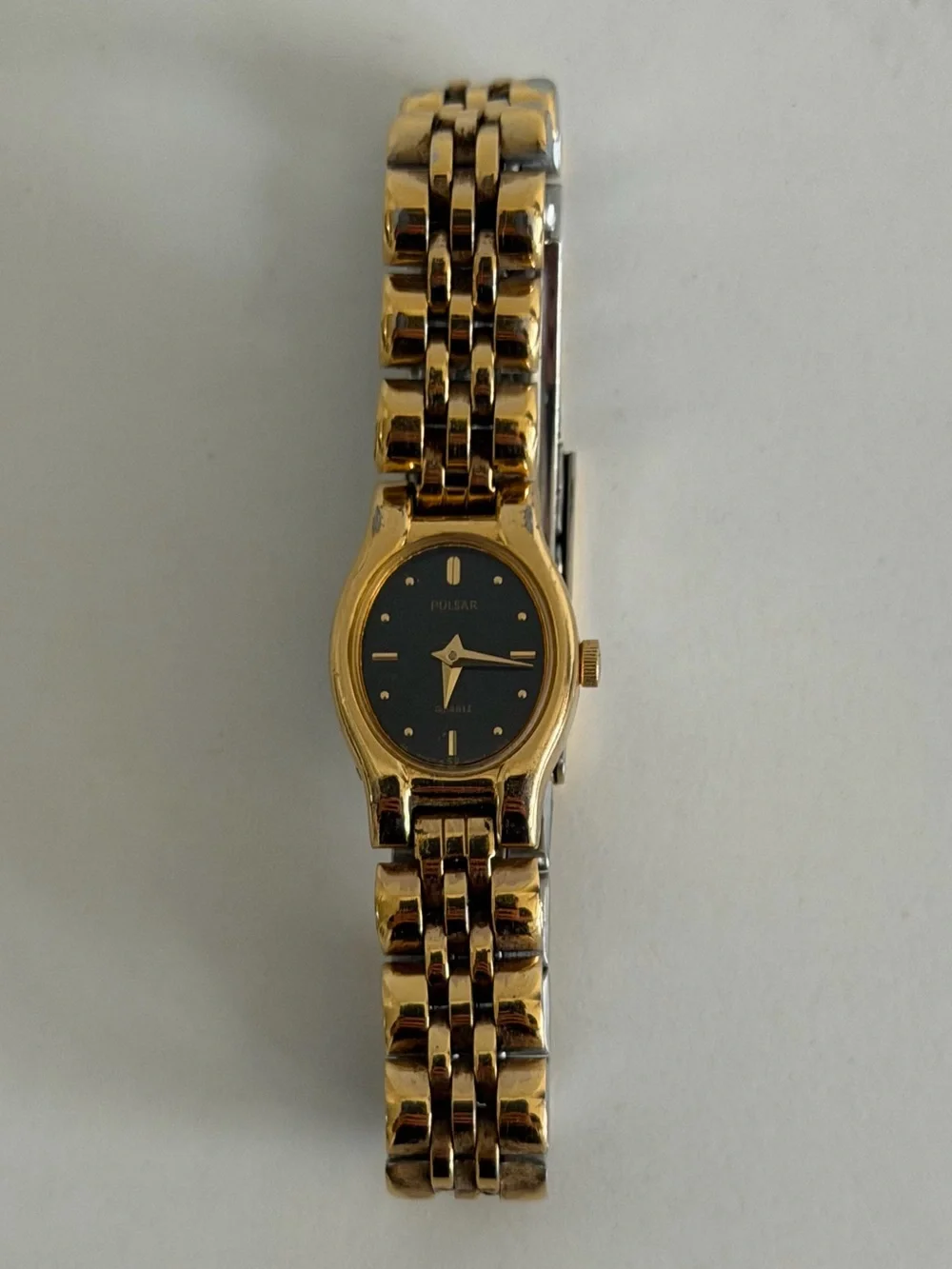 Vintage Pulsar Gold-Tone Watch with Black Dial